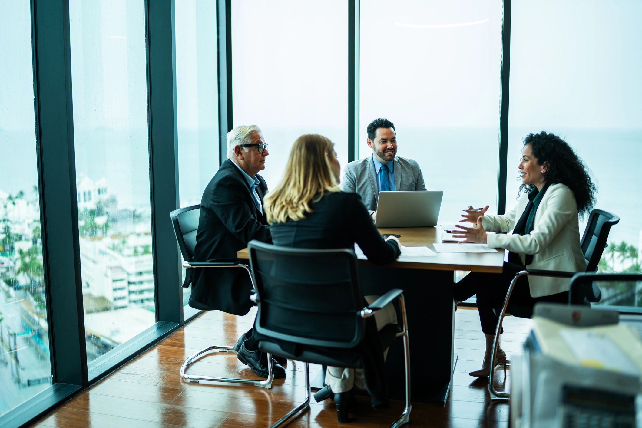 Professionals in a meeting discussing strategy
