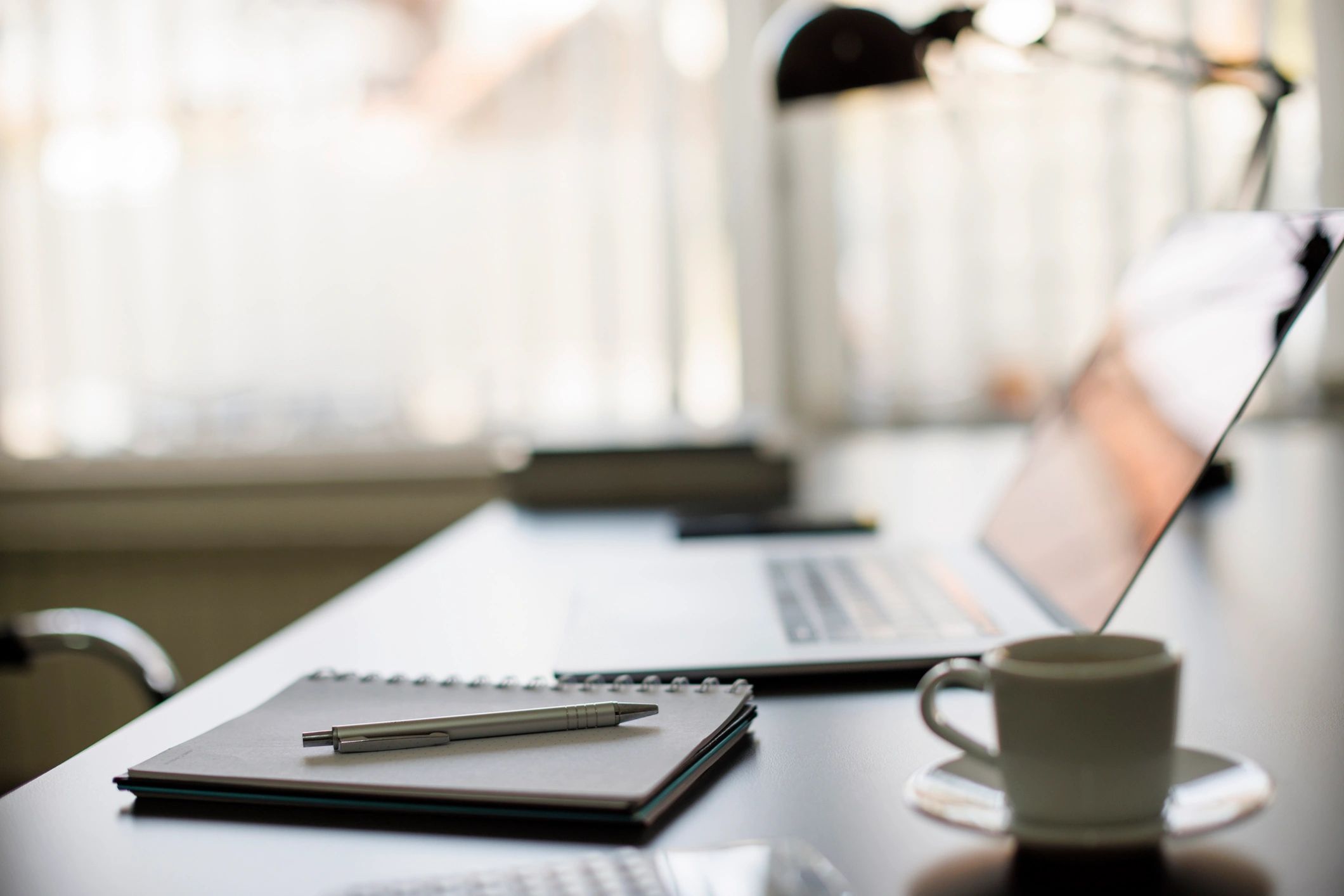 Desk with documents representing underwriting and financial modelling