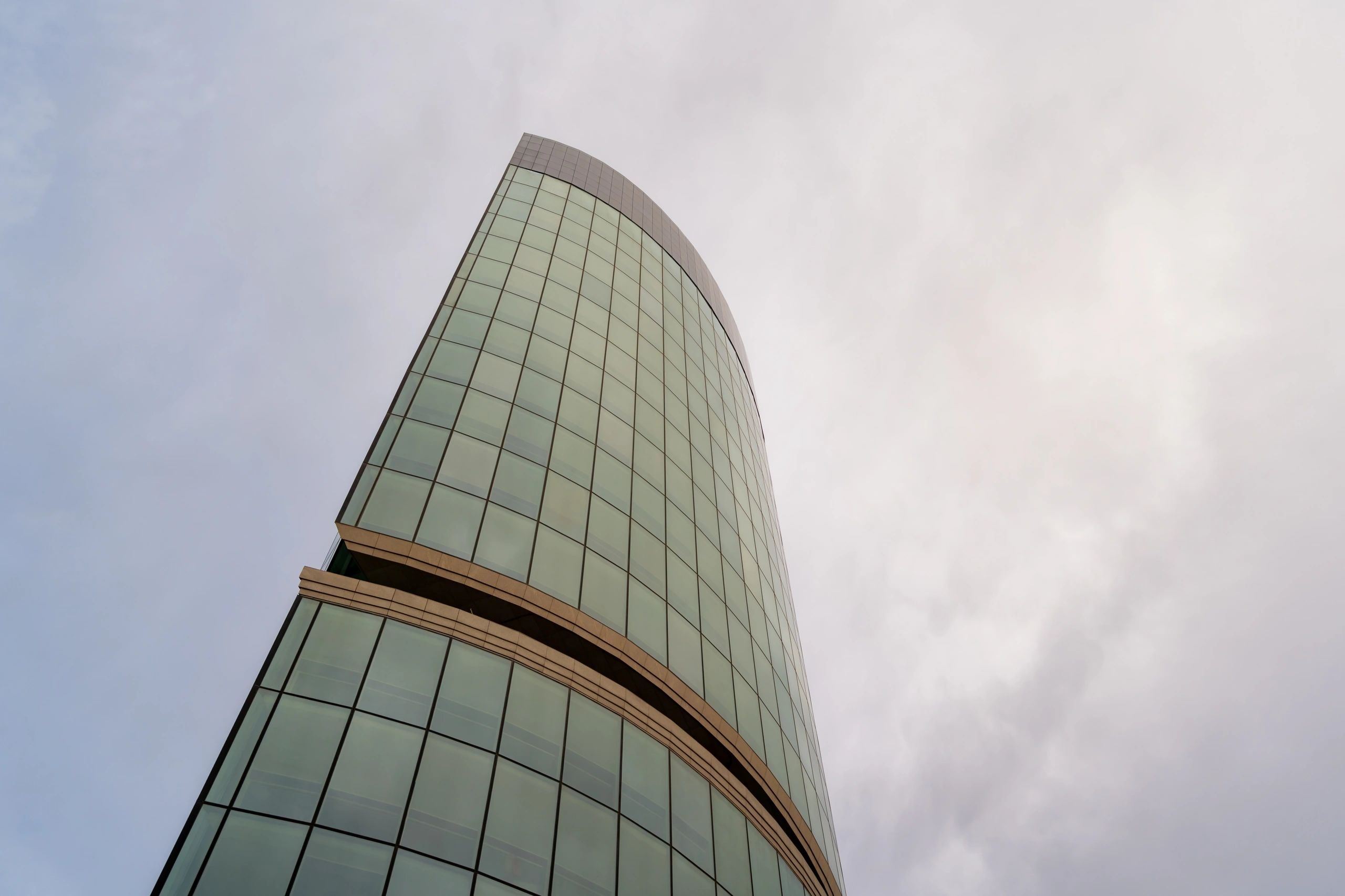 Modern glass commercial building representing development outcomes