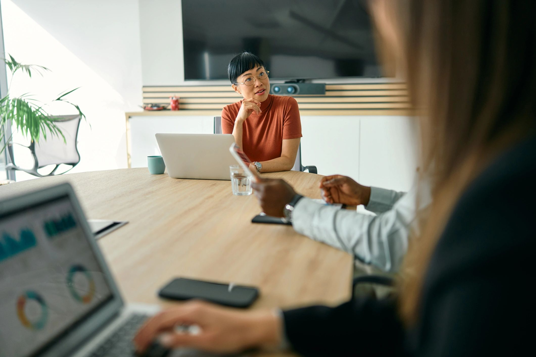 Advisors reviewing charts and data during a research briefing
