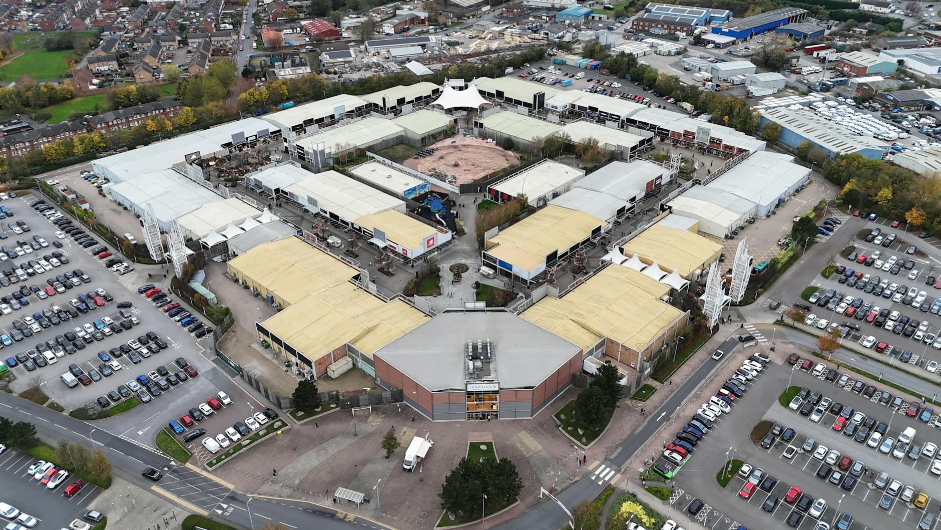 Aerial view of retail shopping centre for commercial real estate network planning